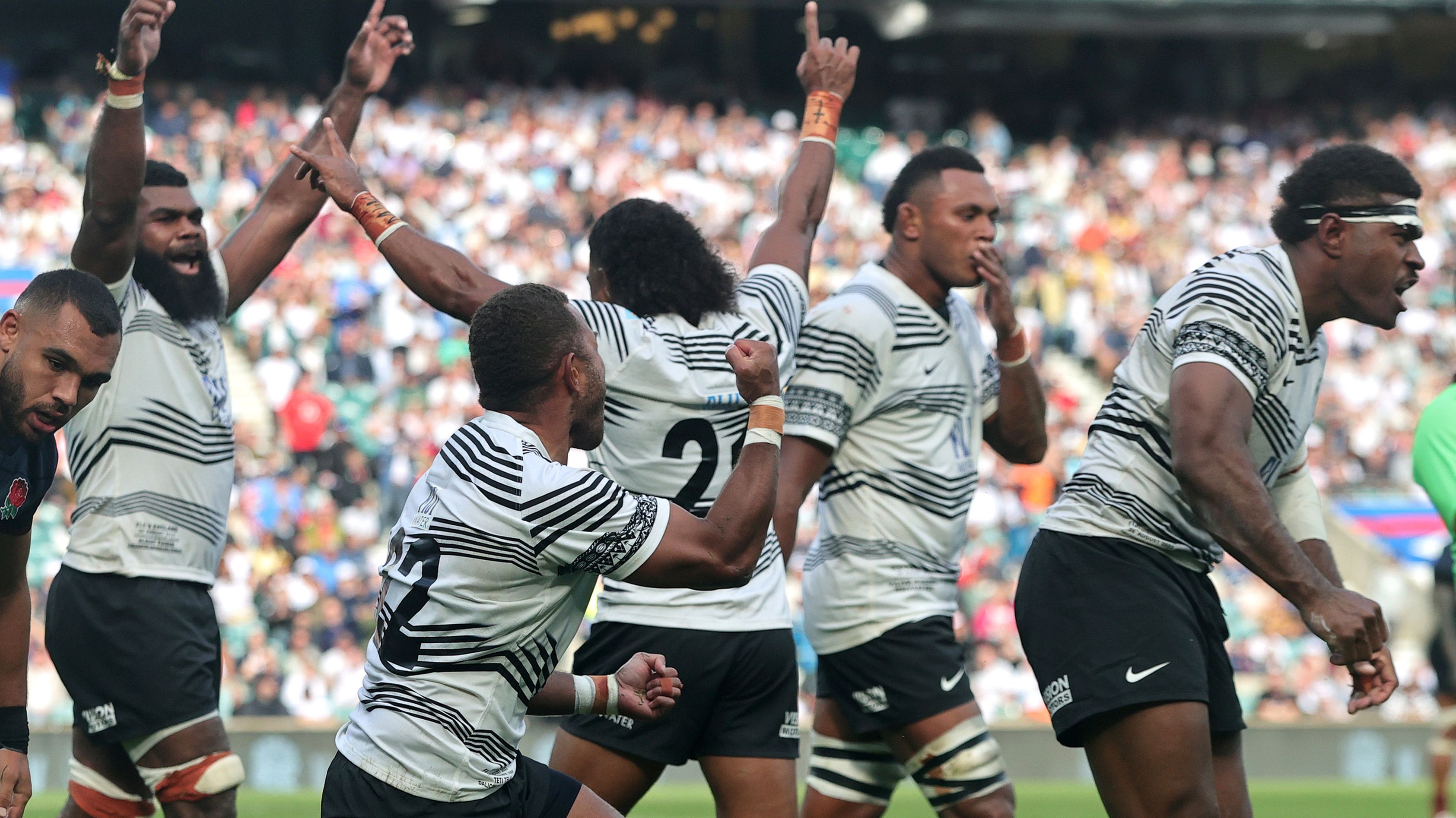 Fiji celebrate their historic victory at the final whistle during against England at Twickenham.