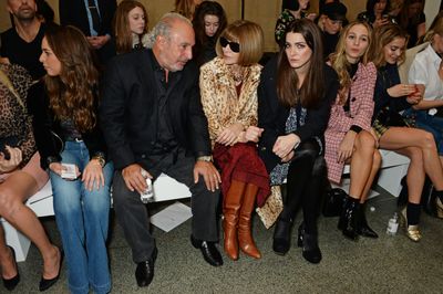 American <em>Vogue</em> editor Anna Wintour and her daughter Bee Shaffer chat to Sir Philip Green (Chairman of the Arcadia Group, a retail giant that includes Topshop).