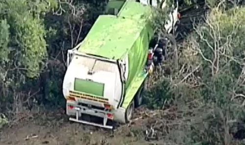 The cyclist was killed after colliding with a garbage truck this morning. Picture: 9NEWS