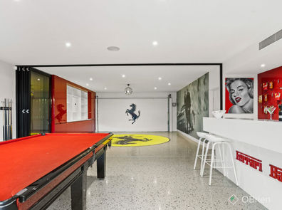 Sprawling Melbourne mansion with  a bespoke "Ferrari bar" is on offer and is expected to sell for around $10 million. 