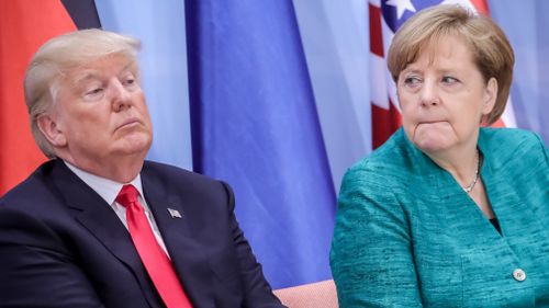 Donald Trump and Angela Merkel at the G20 Summit. (AAP)