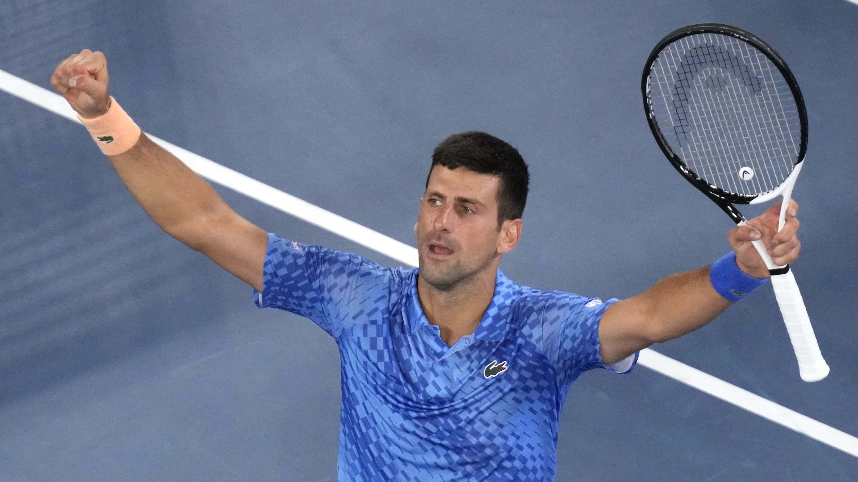Novak Djokovic reacts after defeating Grigor Dimitrov in their third round clash at Rod Laver Arena.