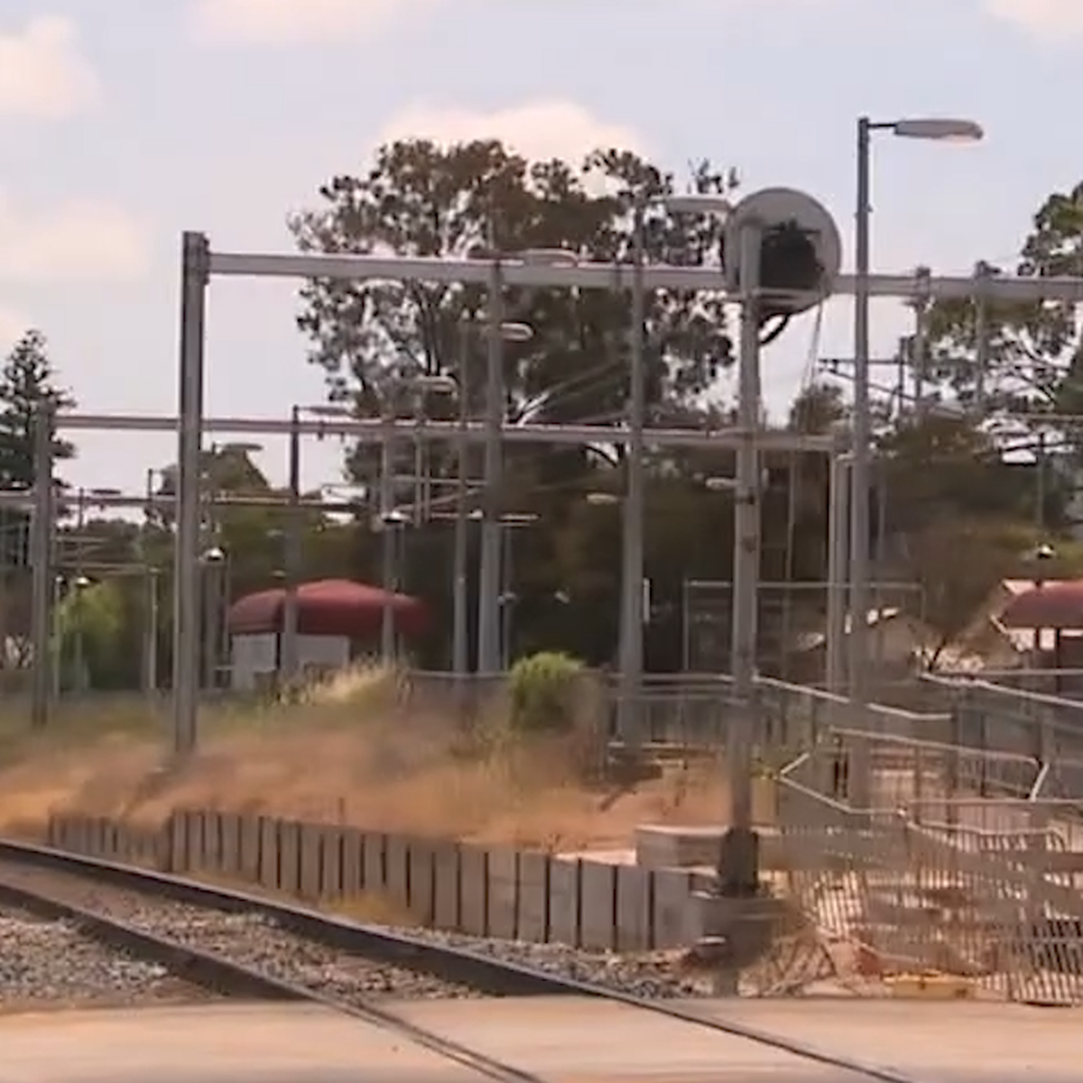 Investigation reveals human error to blame for boom gate failure that  nearly caused freight train crash in Ovingham level crossing in Adelaide