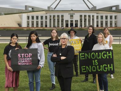 Group photo of Madeleine Chia, Avan Daruwalla, Aoibhinn Crimmins, Janine Hendry, Katchmirr Russell, Helen Dalley-Fisher, Frances Crimmins and Kate Walton on the eve of the Women's March 4 Justice at Parliament House in Canberra on Sunday 14 March 2021. fedpol Photo: Alex Ellinghausen