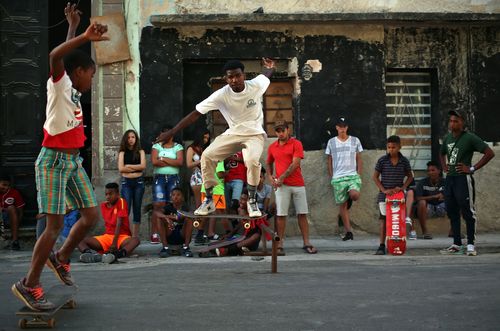 Cuban children play in the street as their country moves to a new leader. (AAP)