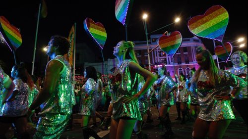 The parade and surrounding festival attracts tens of thousands of people to Sydney every year.