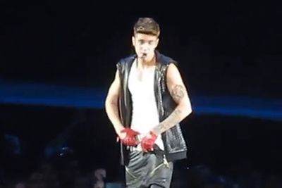 August 2013: Now this is classy. At a concert in New Jersey, Justin blasted fans for throwing things on stage. And then came a fan's iPhone ... that peeved off the Biebs big time. Justin took matters into his own hands and shoved the phone down his pants. He returned the phone into the crowd, but not to the fan who threw it. A special edition keepsake, apparently!<br/><br/>Image: YouTube
