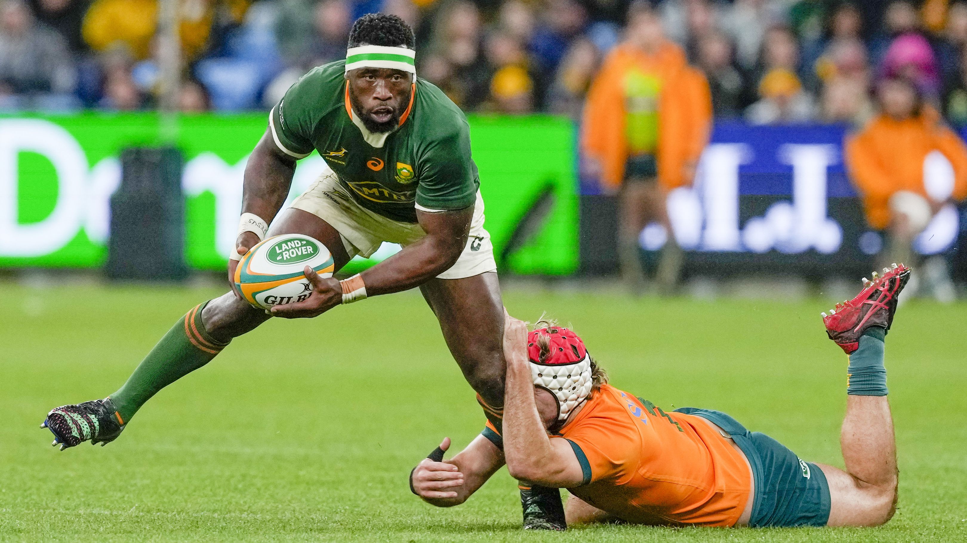 South Africa&#x27;s Siya Kolisi runs at the defense during the second Rugby Championship test match between the Wallabies and the Springboks in Sydney.