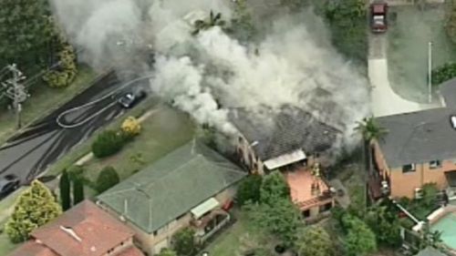 A man has been taken to hospital with burns after a house fire in Castle Hill. (9NEWS)