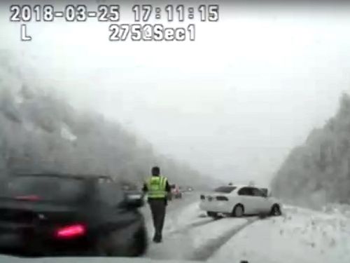 State trooper Cade Brenchley was struck by a car while trying to help another car that appeared to have skidded across the road in Utah.