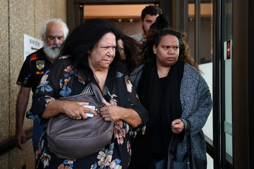 Family and supporters of victims leave the Supreme Court in Sydney.