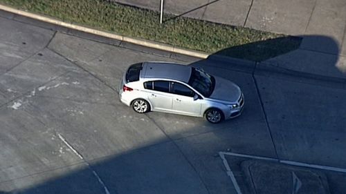 A car carrying Matthew De Gruchy leaves Long Bay jail.