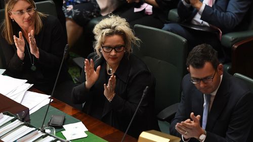 Minister for Public Transport Jacinta Allan, Health Minister Jill Hennessy and Premier Daniel Andrews are seen after the Victoria assisted dying bill passed in the Legislative Council in Melbourne. (AAP Image/Julian Smith) 