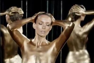 Ricki-Lee is the latest popstar to cover herself in body paint (and only body paint!) for the sake of a music video. Let's take a look back in the pop archives at other daring and baring singers.