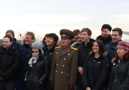 Some members of Vexxed's tour group with a DPRK soldier. Source: Supplied