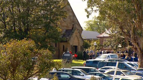 Hundreds of mourners gathered for Archie Hunt's funeral today. (9NEWS)