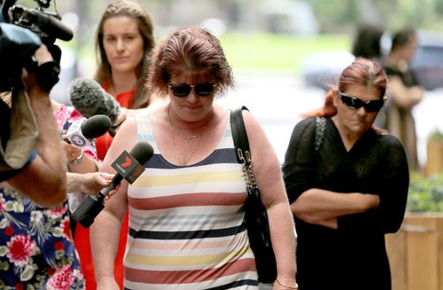 The mother of victim Alexander Watts leaves the Supreme Court in Adelaide today following Falkiner's sentence.