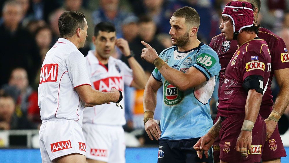 Robbie Farah speaks to Gerard Sutton about a bunker decision. (Getty)