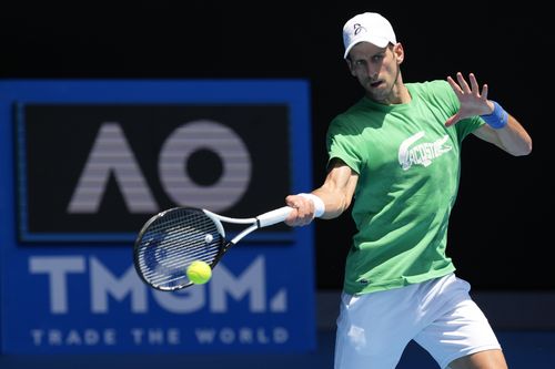 Defending mens champion Serbia's Novak Djokovic practices on Margaret Court Arena ahead of the Australian Open tennis championship in Melbourne, Australia, Thursday, Jan. 13, 2022. 