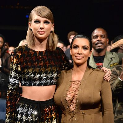 Taylor Swift and Kim Kardashian at the 2015 MTV Video Music Awards on August 30, 2015 in Los Angeles, California.