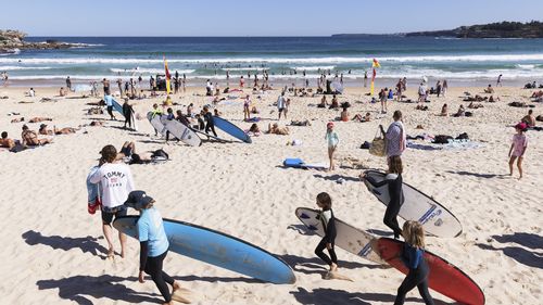 Crowds gather at Bondi Beach  in Sydney.