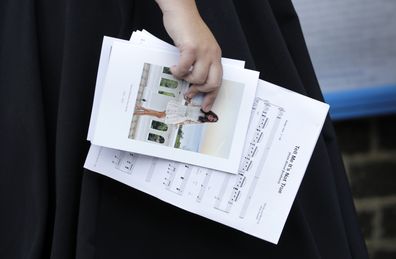 Sheet music and an order of service held by Natalie Rushdie as she attends the funeral of Dame Deborah James at St Mary's Church on July 20, 2022 in Barnes, England