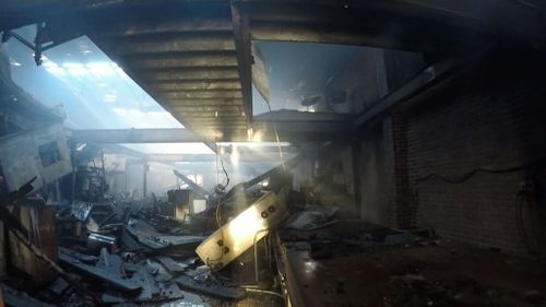 The fire completely destroyed the inside of the building. (9NEWS)