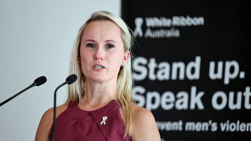 White Ribbon Ambassador Angela Jay speaks during a White Ribbon Day Parliamentary Breakfast at Parliament House in Canberra. (AAP)
