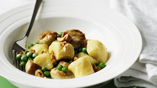 Gnocchi with sweetbreads, peas and hazelnuts