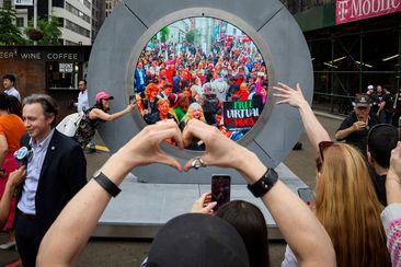 New Yorkers greet people in Dublin during the reveal of New York City&#x27;s Portal on May 8.