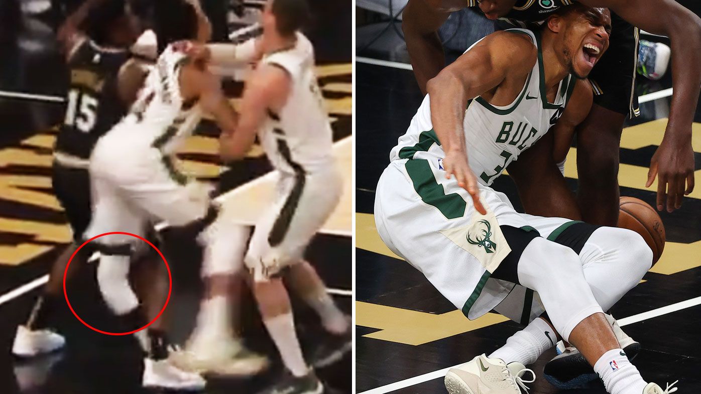 Giannis Antetokounmpo goes down with a horror knee injury against the Hawks in Game 4.
