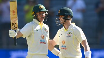 Marnus Labuschagne of Australia is congratulated by Steve Smith after making his century. (Photo by Quinn Rooney - CA/Cricket Australia via Getty Images)