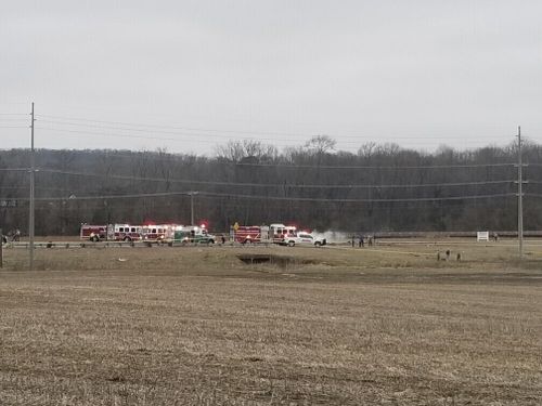 Police and fire personnel respond to a Black Hawk helicopter crash Wednesday, Feb. 15, 2023, in the unincorporated community of Harvest, Ala. U.S. military officials say two people on board the helicopter, which was from the Tennessee National Guard, were killed. 