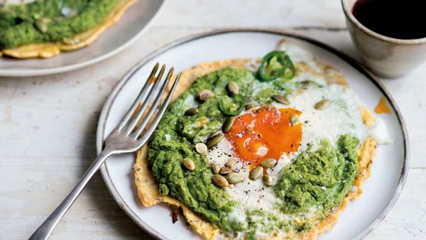 Chickpea flatbreads topped with spinach and egg