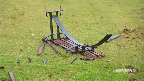 Park benches were ripped up and grass was destroyed before the car crashed into a playground.