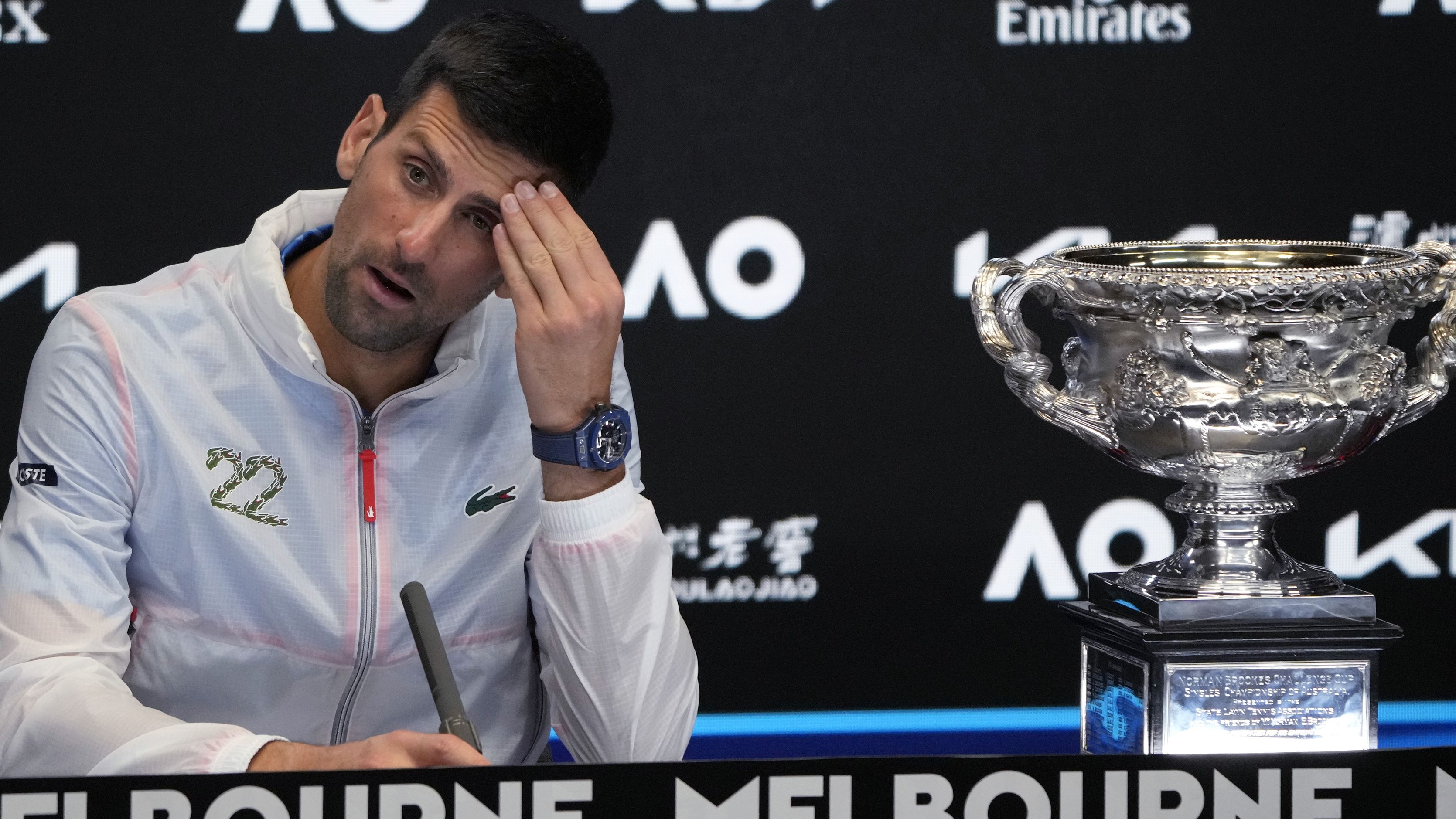 Novak Djokovic of Serbia reacts during a press conference.