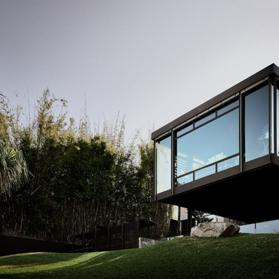 Layout of Brisbane home sees a 'glass box' suspended over the pool