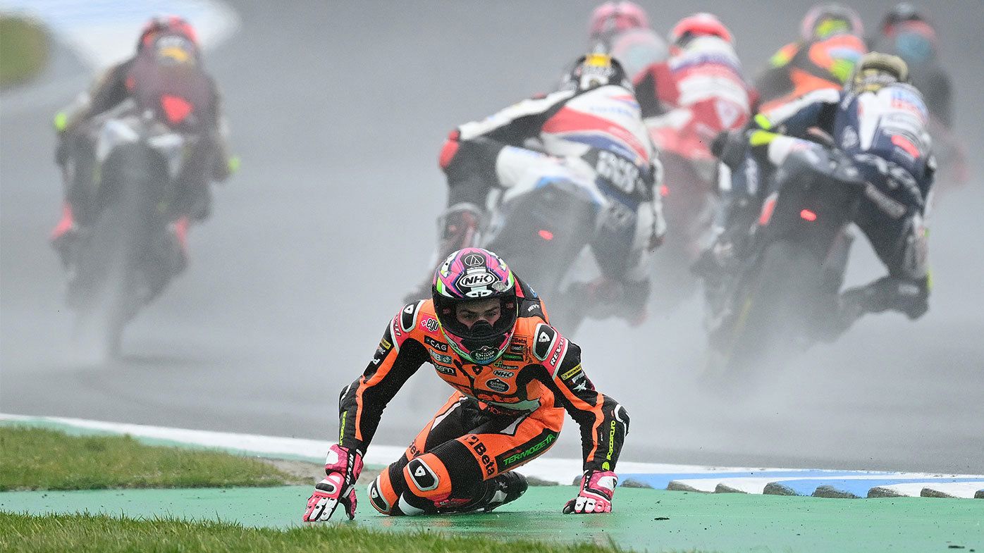 Alonzo Lopez takes a tumble during the MotoGP in Phillip Island on Sunday