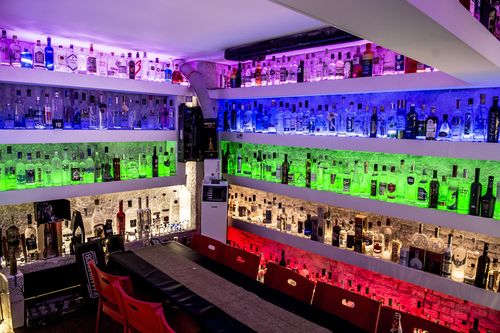 The bar owner has more than 1200 bottles of vodka on display. (AAP)