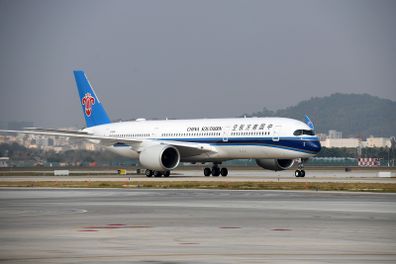 An Airbus A350-900 arrives at the Baoan International Airport in Shenzhen, south China's Guangdong Province, Jan. 6, 2022. China Southern Airlines launched two new Airbus A350-900 in Shenzhen on Thursday. The new aircraft will mainly serve domestic routes between Beijing Daxing International Airport, Shanghai and Chengdu. (Photo by Liang Xu/Xinhua via Getty Images)