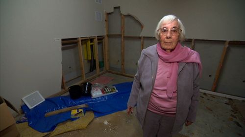 Maurine Moore had to deal with a leak in her unit after a pipe burst.