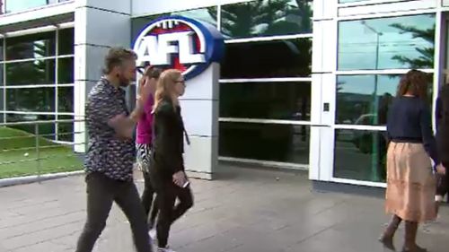 Dozens of staff returned to the building about 1.30pm. (9NEWS)