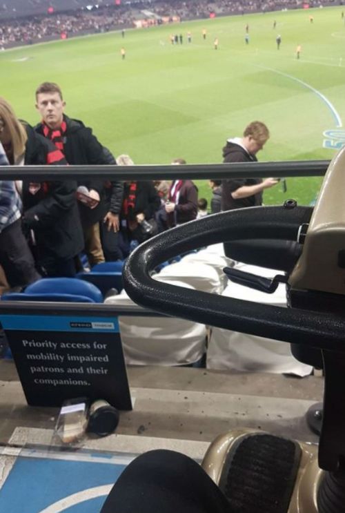 Reddit user bluejeans90210 posted an image on a mobility scooter at an AFL match. (Reddit)