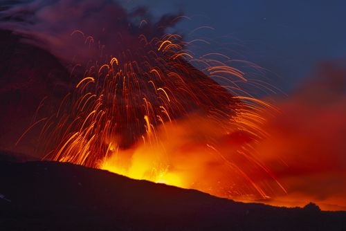 Mount Etna in Sicily has roared back into spectacular volcanic action from Thursday morning, sending up plumes of ash and spewing lava. 