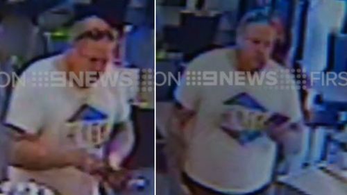 CCTV caught the Rebels bikie paying his bill and checking his phone. (9NEWS)