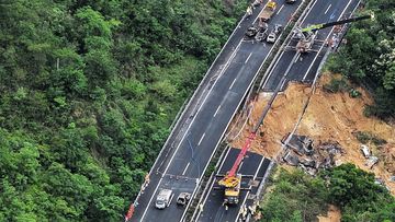 At least 24 dead in China road collapse disaster after record rain