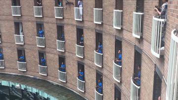 Fijian rugby players&#x27; rousing song on their balconies.