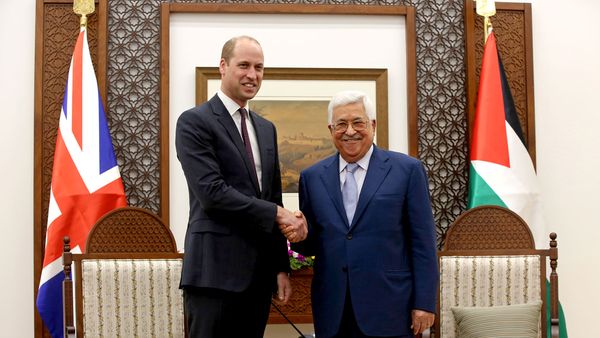 Prince William shakes hands with Palestinian President Mahmoud Abbas in the West Bank City of Ramallah. (AAP)