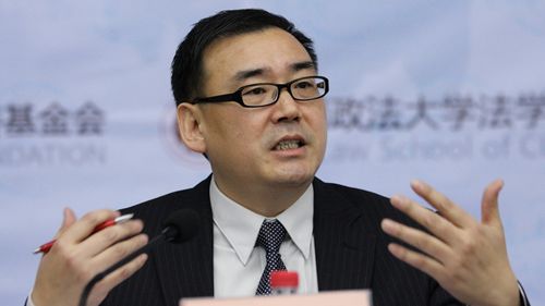 Chinese-Australian writer Yang Hengjun attends a lecture at Beijing Institute of Technology in Beijing, China, in 2010. 