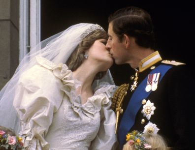 FILE - In this July 29, 1981 file photo, Britain's Prince Charles kisses his bride, Princess Diana, on the balcony of Buckingham Palace in London, after their wedding. Prince Charles has been preparing for the crown his entire life. Now, that moment has finally arrived. Charles, the oldest person to ever assume the British throne, became king on Thursday Sept. 8, 2022, following the death of his mother, Queen Elizabeth II. (AP Photo, File)